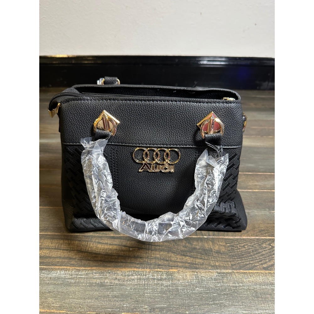 Audi Black Pebbled Faux Leather Satchel Handbag Gold Tone Hardware Logo Purse